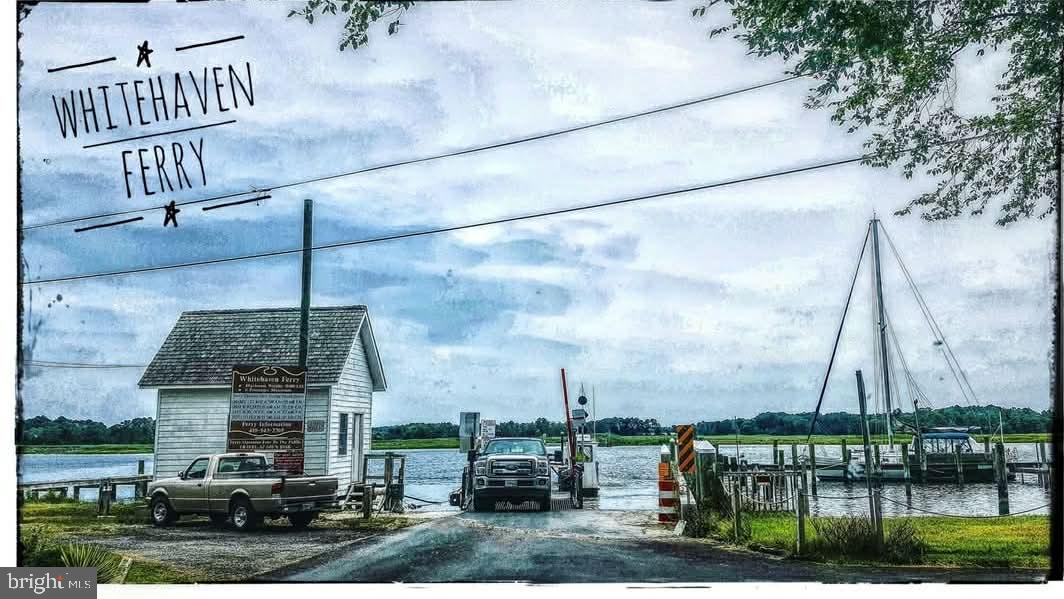 6020 Catchpenny Road Quantico, MD 21856 - Photo 7 of 7 a front view of a house with garden