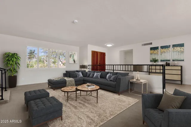 a view of a room with windows