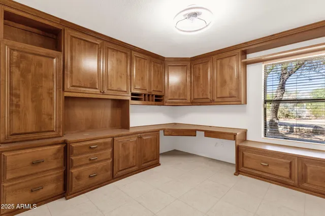 a view of a hallway with closet area
