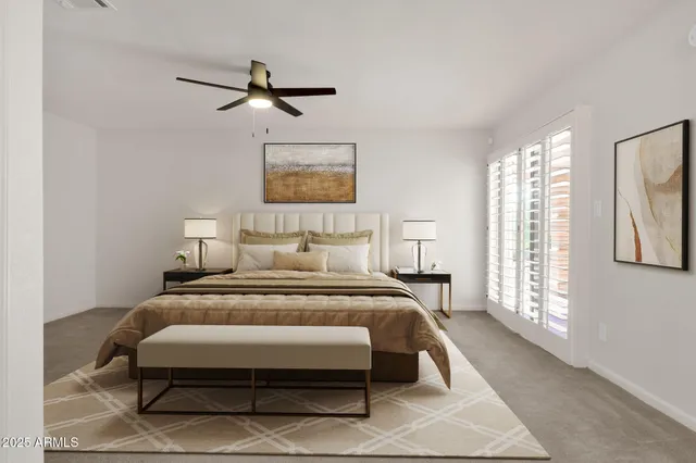 a bathroom with a granite countertop sink toilet and a mirror
