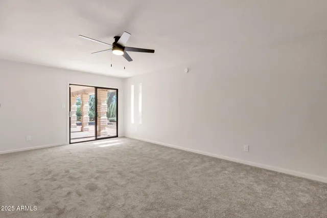 an aerial view of residential house with parking space