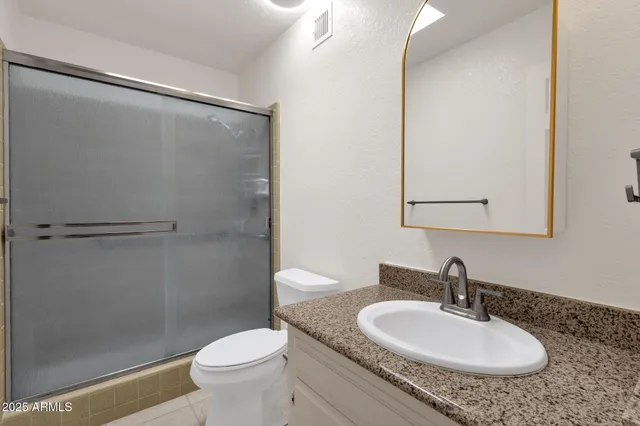 an aerial view of a city with lots of residential buildings