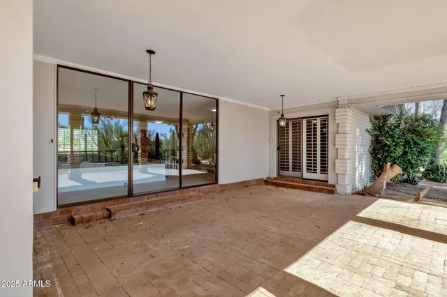 an aerial view of residential house with outdoor space