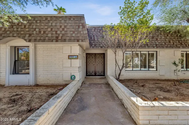 a view of an empty room with a balcony