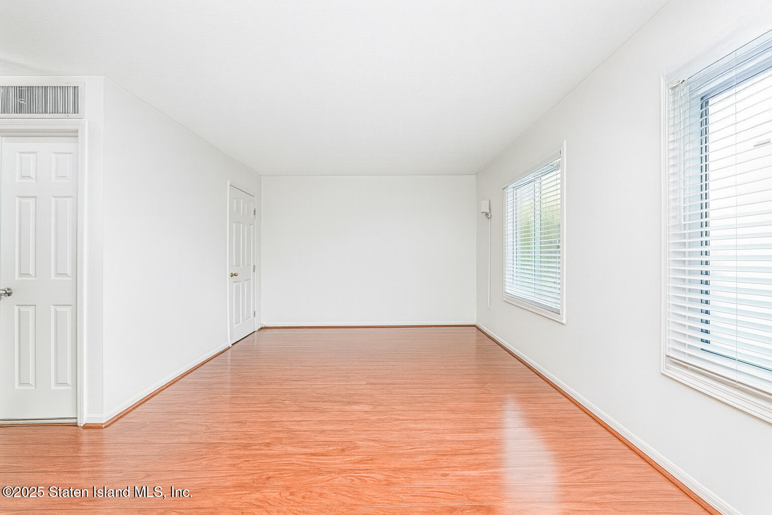 70 Ilyssa Way Staten Island, NY 10312 - Photo 25 of 39 a view of an empty room with a window