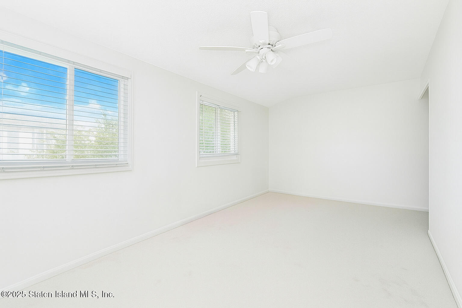 70 Ilyssa Way Staten Island, NY 10312 - Photo 31 of 39 an empty room with a window