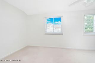 70 Ilyssa Way Staten Island, NY 10312 - Photo 32 of 39 a view of an empty room with a window