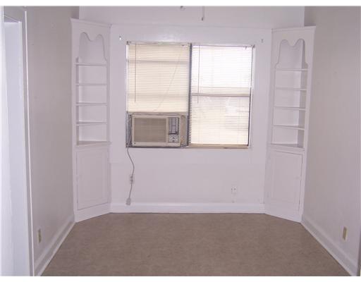 1224 2nd Street, Unit 3 Corpus Christi, TX 78404 - Photo 4 of 9 a view of an empty room with a window