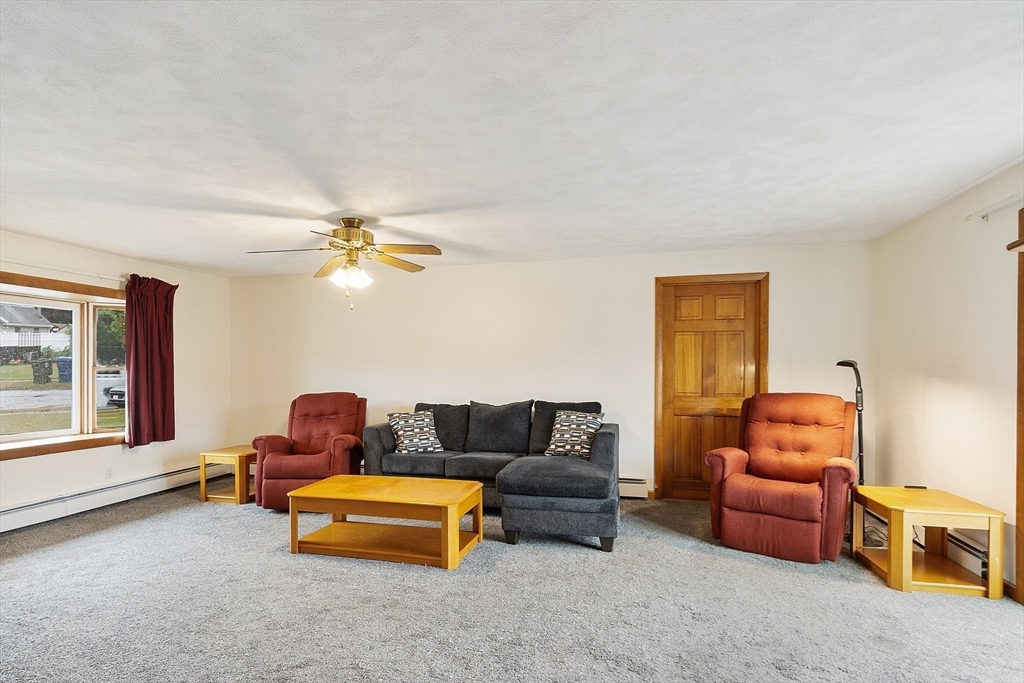 6 Colgate Street Danvers, MA 01923 - Photo 15 of 38 a living room with furniture and a window