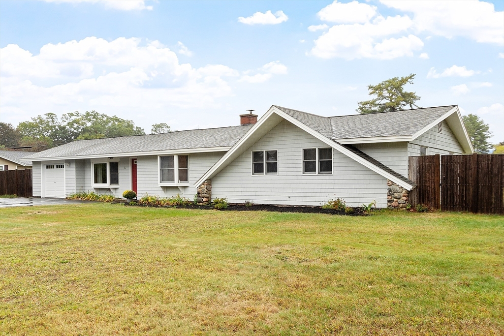 6 Colgate Street Danvers, MA 01923 - Photo 2 of 38 a view of a house with a swimming pool and a yard