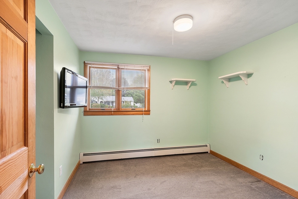 6 Colgate Street Danvers, MA 01923 - Photo 24 of 38 an empty room with a window