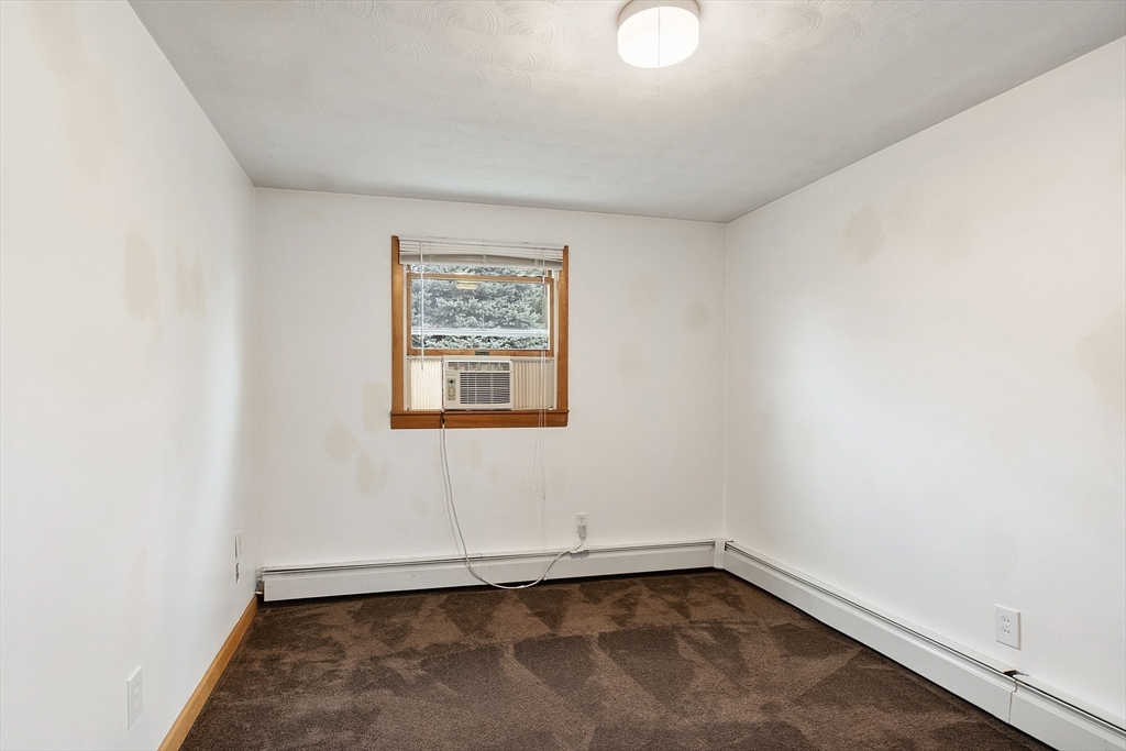 6 Colgate Street Danvers, MA 01923 - Photo 27 of 38 an empty room with a window