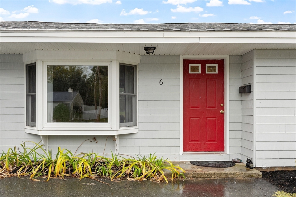 6 Colgate Street Danvers, MA 01923 - Photo 3 of 38 a front view of a house with many windows