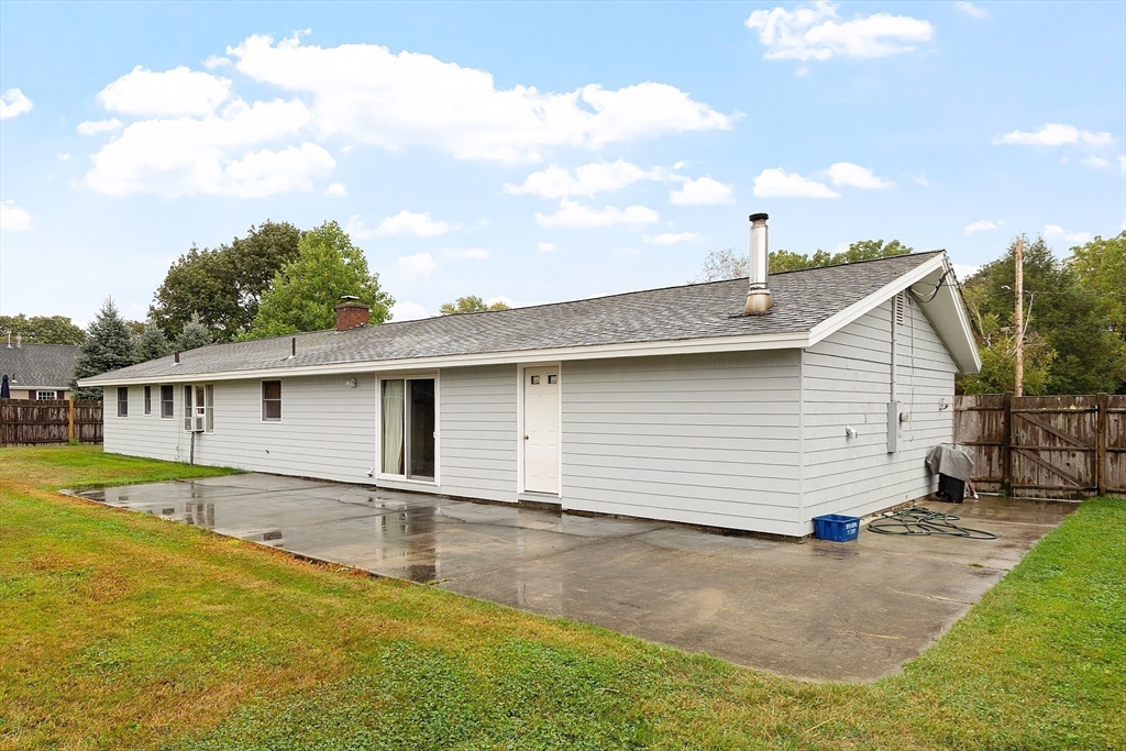 6 Colgate Street Danvers, MA 01923 - Photo 32 of 38 a view of a backyard with a garden and plants