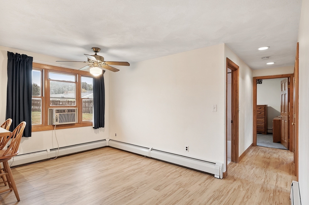 6 Colgate Street Danvers, MA 01923 - Photo 9 of 38 wooden floor in an empty room with a window