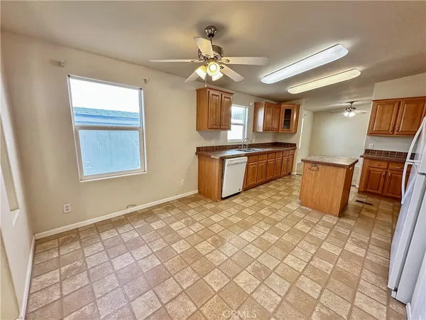 a living room with granite countertop furniture and a window