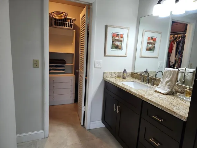 a view of a park with large trees