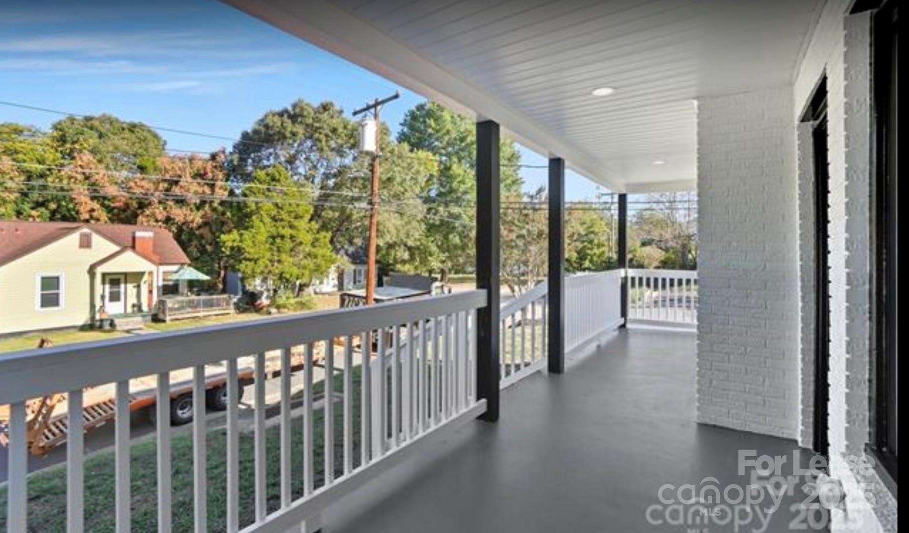 64 Brumley Avenue Northeast Concord, NC 28025 - Photo 3 of 19 a view of a city from a balcony