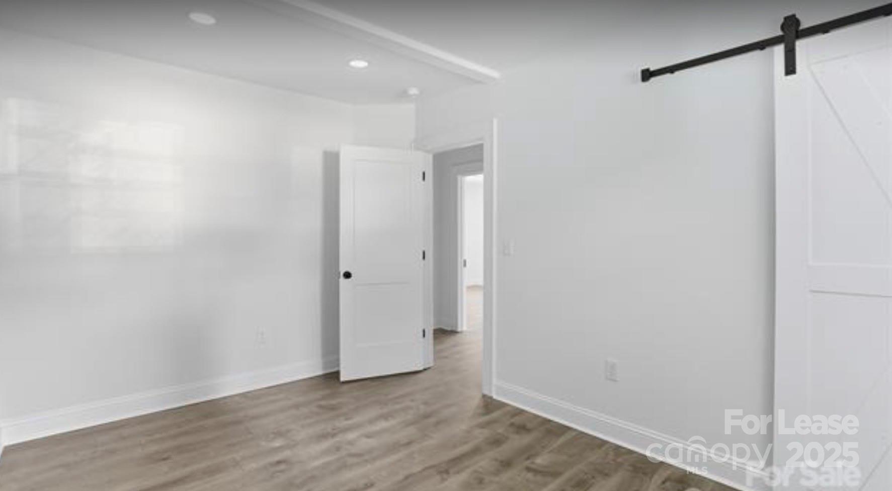 64 Brumley Avenue Northeast Concord, NC 28025 - Photo 10 of 19 a view of an empty room