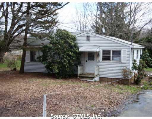 170 Summit Road Prospect, CT 06712 - Photo 1 of 1 a view of a house with a yard and wooden fence