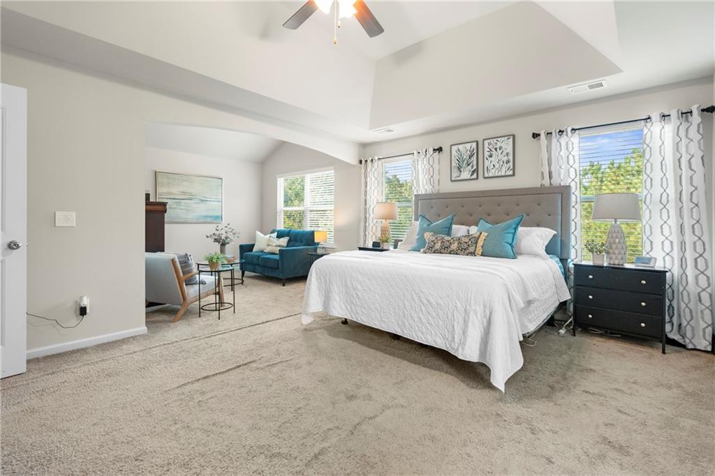 511 Autumn Echo Canton, GA 30114 - Photo 18 of 45 a bedroom with bed and a large window