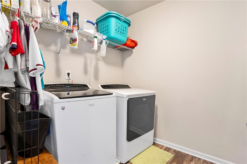 511 Autumn Echo Canton, GA 30114 - Photo 29 of 45 a utility room with dryer and washer