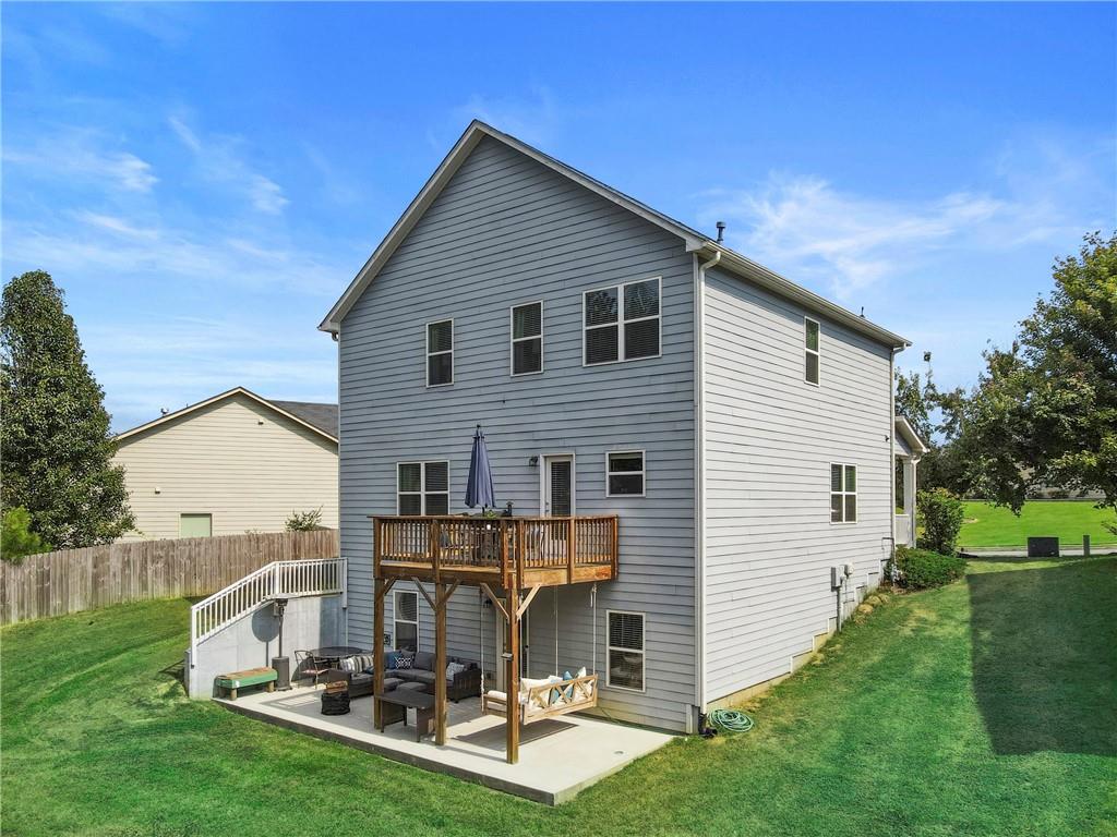 511 Autumn Echo Canton, GA 30114 - Photo 39 of 45 a view of a house with backyard