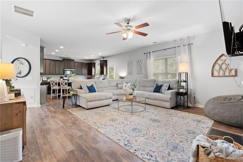 511 Autumn Echo Canton, GA 30114 - Photo 9 of 45 a living room with furniture and a flat screen tv
