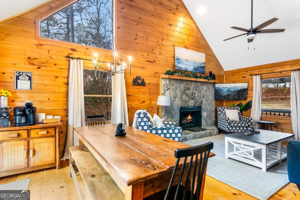 174 Seneca Way, Unit 116 Ellijay, GA 30540 - Photo 3 of 39 a outdoor space with the couches and a fireplace