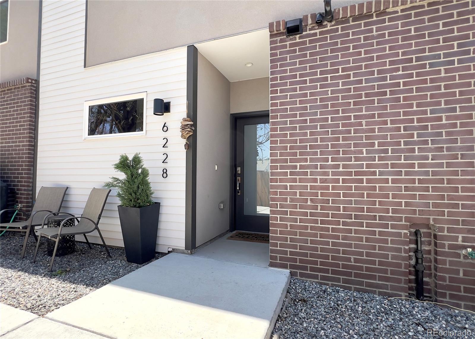 6228 West 38th Avenue Wheat Ridge, CO 80033 - Photo 3 of 38 a view of door with outdoor space