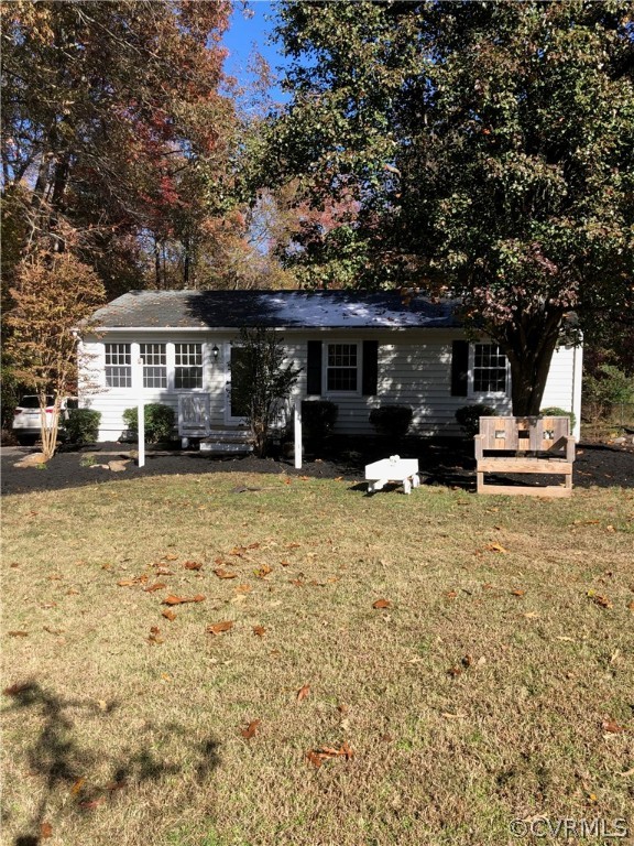 11636 River Road Chesterfield, VA 23838 - Photo 3 of 50 a front view of a house with a yard and trees