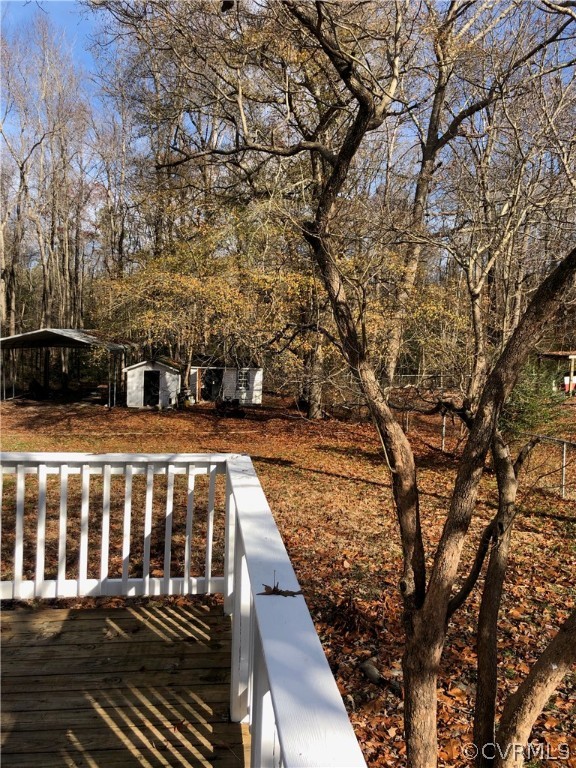 11636 River Road Chesterfield, VA 23838 - Photo 39 of 50 a view of a brick house with a yard