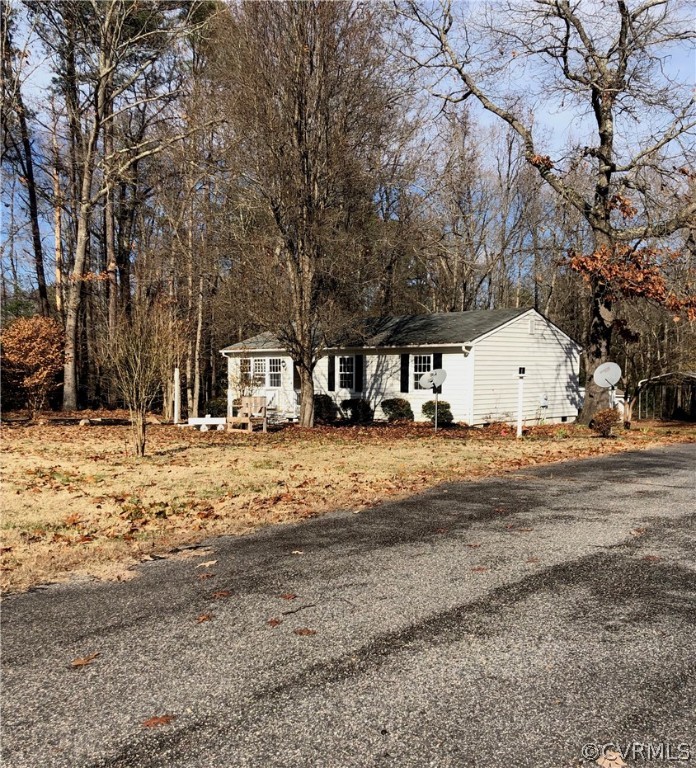 11636 River Road Chesterfield, VA 23838 - Photo 48 of 50 a house with trees in front of it