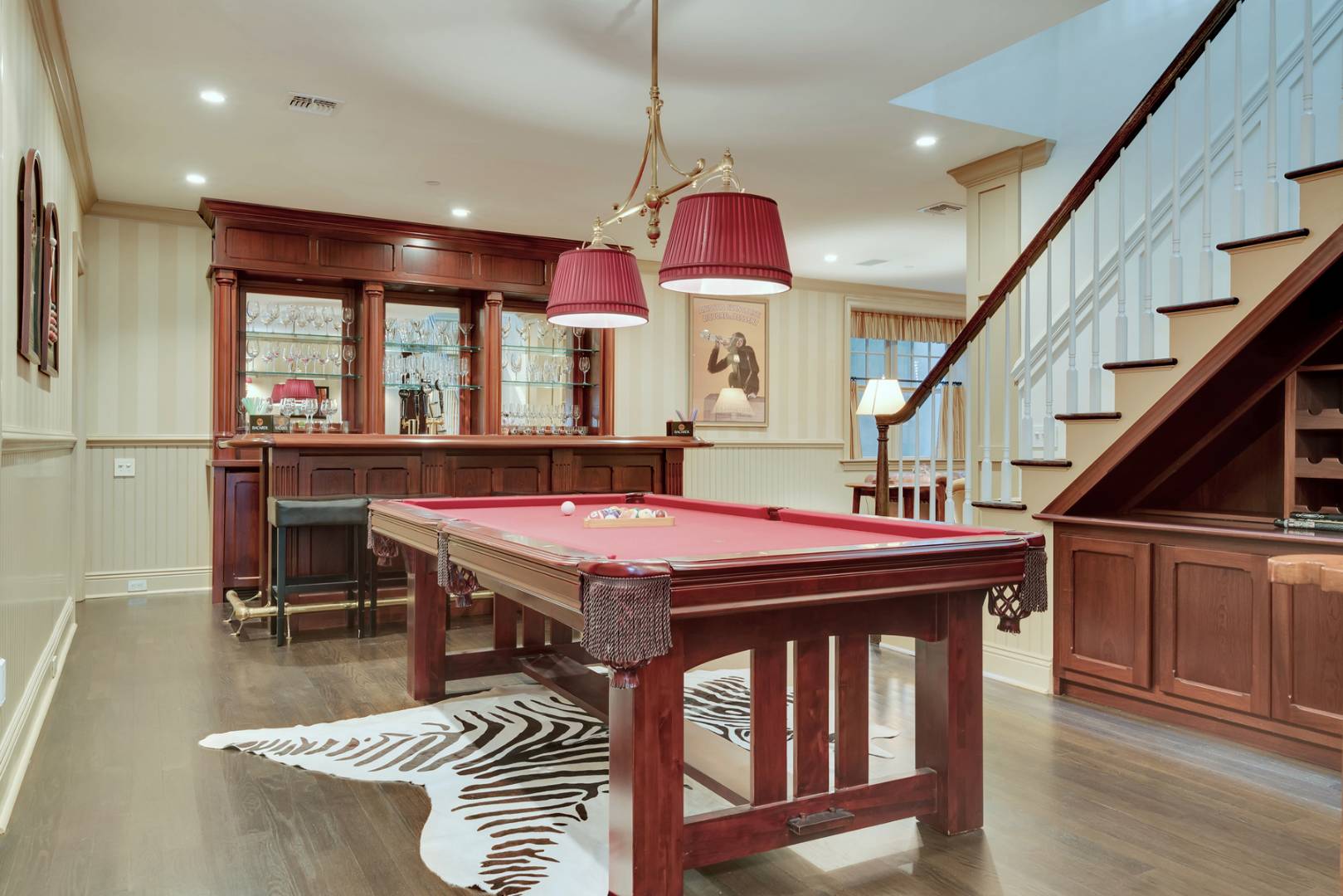 228 Little Plains Road Southampton, NY 11968 - Photo 17 of 17 a dining hall with couches a dining table and chairs with wooden floor