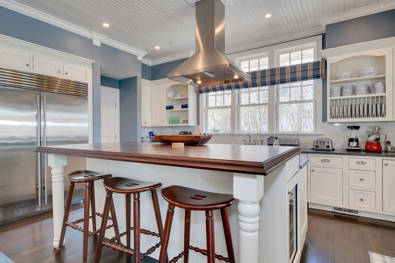 228 Little Plains Road Southampton, NY 11968 - Photo 6 of 17 a kitchen with stainless steel appliances granite countertop a stove a sink and a refrigerator