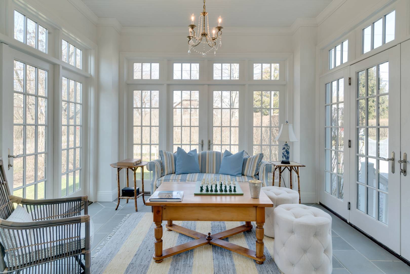 228 Little Plains Road Southampton, NY 11968 - Photo 8 of 17 a living room with furniture and a floor to ceiling windows