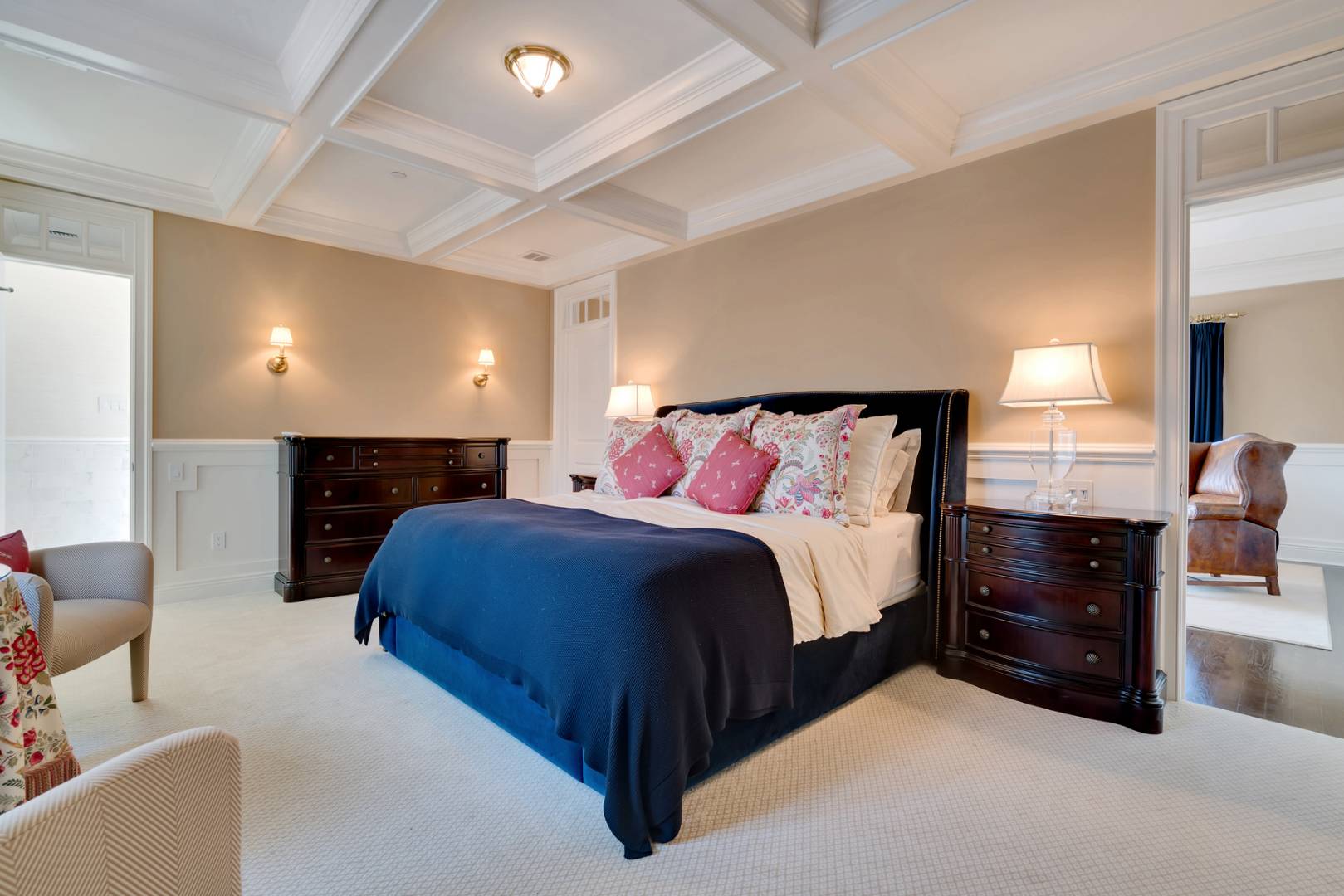 228 Little Plains Road Southampton, NY 11968 - Photo 9 of 17 a spacious bedroom with a bed and a lamp