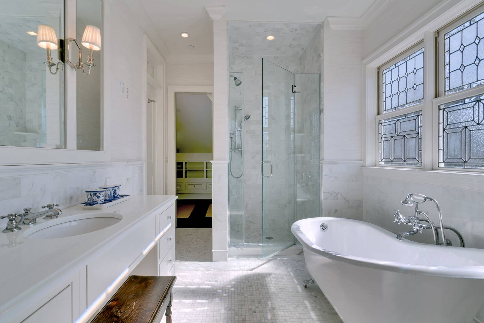 228 Little Plains Road Southampton, NY 11968 - Photo 10 of 17 a bathroom with a sink a toilet a mirror and shower