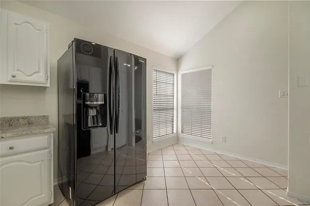 a bathroom with a shower and closet