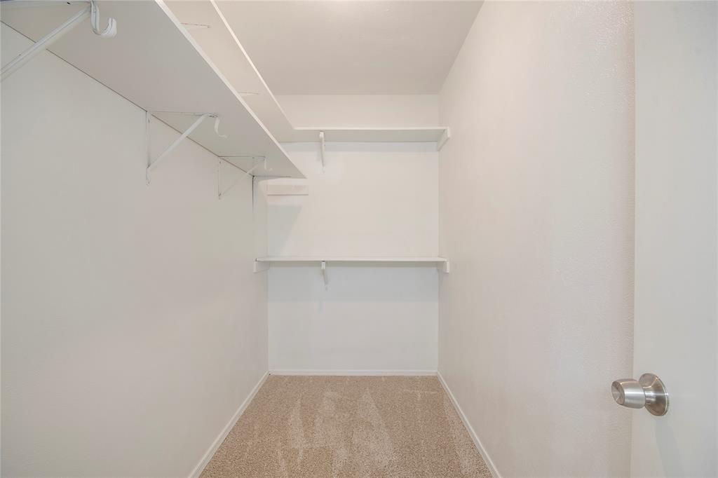 6817 Anderson Drive The Colony, TX 75056 - Photo 15 of 21 a view of a room with shelf