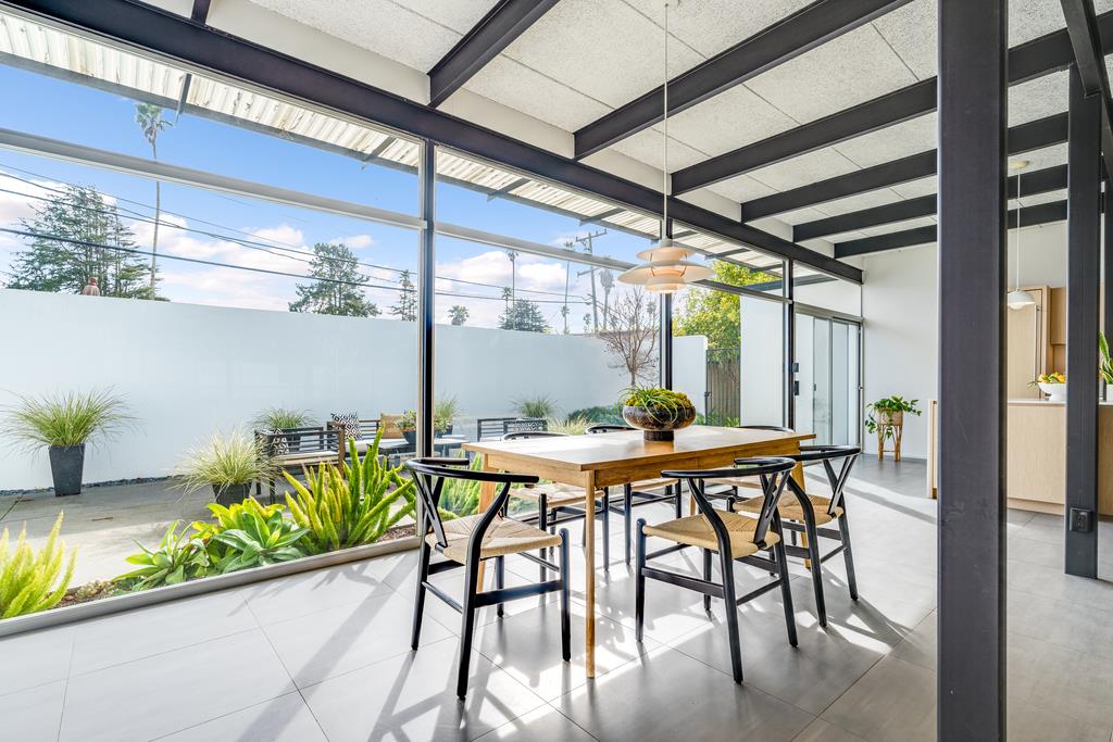 51 Asta Drive La Selva Beach, CA 95076 - Photo 12 of 43 a view of an outdoor dining space with a table and chairs in patio