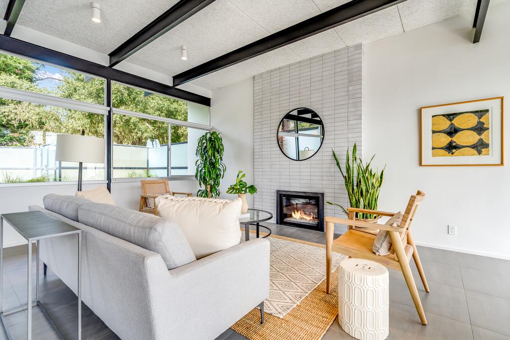 51 Asta Drive La Selva Beach, CA 95076 - Photo 15 of 43 a living room with furniture a fireplace and a large window