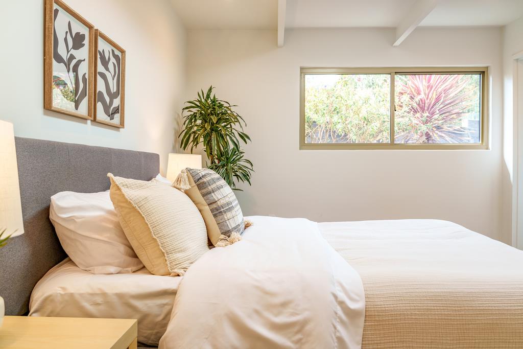 51 Asta Drive La Selva Beach, CA 95076 - Photo 19 of 43 a bedroom with two beds and a potted plant