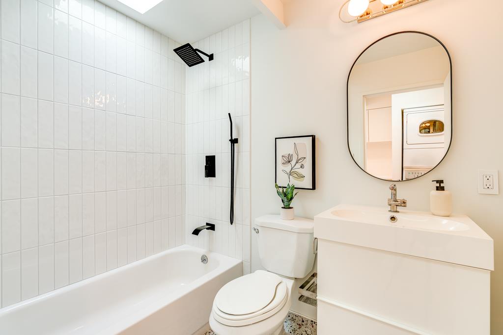 51 Asta Drive La Selva Beach, CA 95076 - Photo 23 of 43 a bathroom with a toilet sink and a mirror