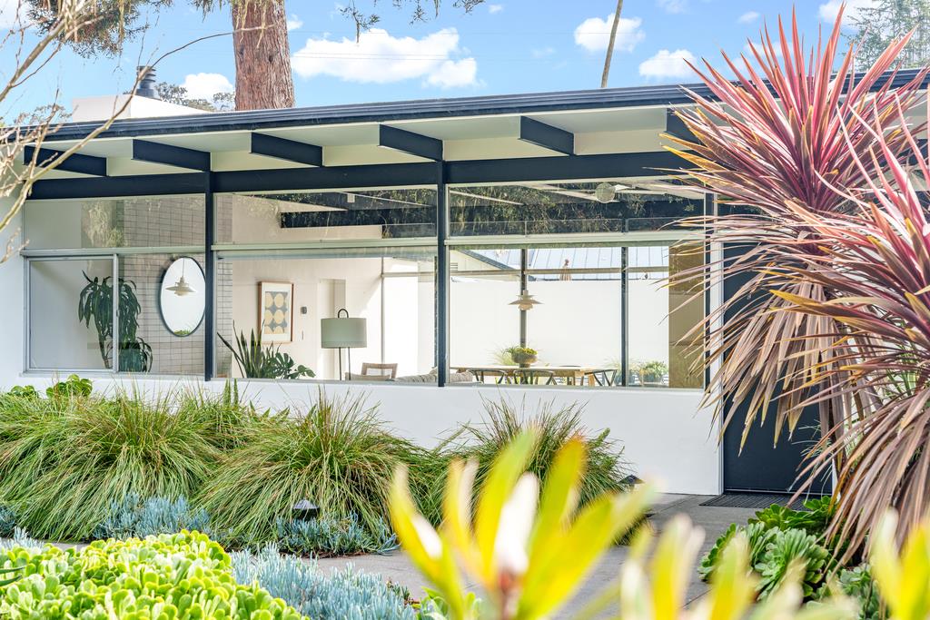 51 Asta Drive La Selva Beach, CA 95076 - Photo 38 of 43 a view of a swimming pool with a lawn chairs under an umbrella