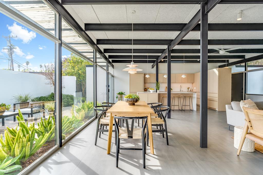 51 Asta Drive La Selva Beach, CA 95076 - Photo 6 of 43 a dining room with furniture and a floor to ceiling window