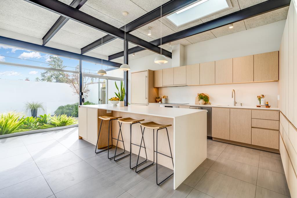 51 Asta Drive La Selva Beach, CA 95076 - Photo 7 of 43 a kitchen with a sink window and cabinets