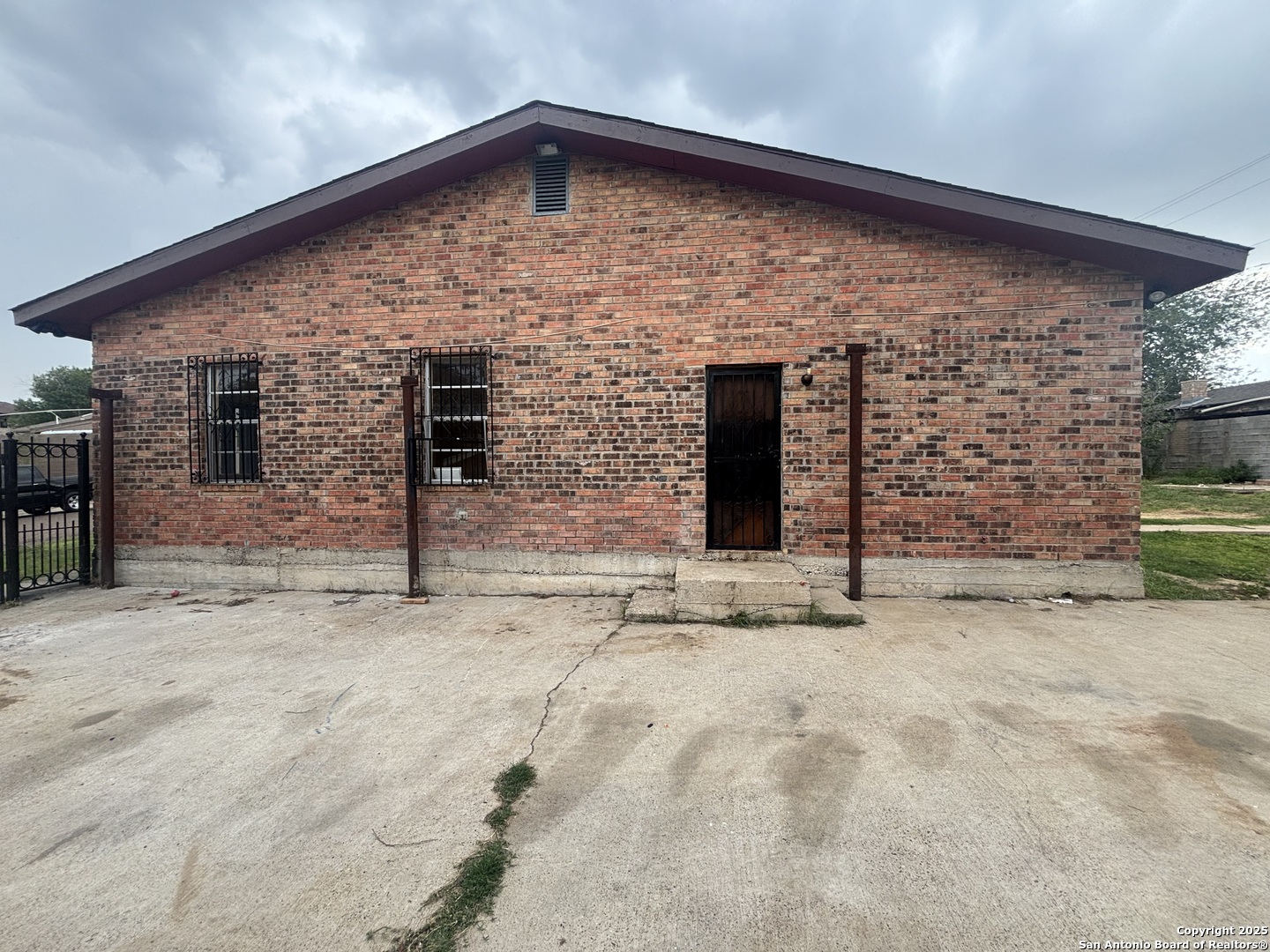 205 Sunset Loop Laredo, TX 78046 - Photo 37 of 38 a front view of a stone house
