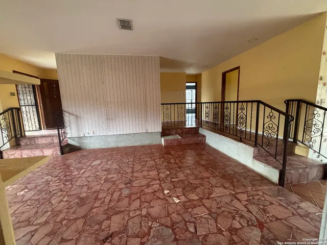 a view of a terrace with sky view