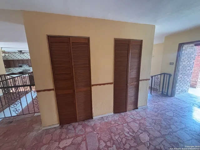 a view of a street with a yard